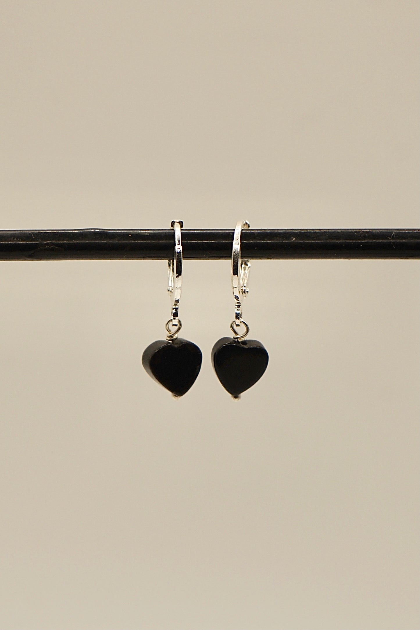 Sterling silver subtle heart onyx earrings