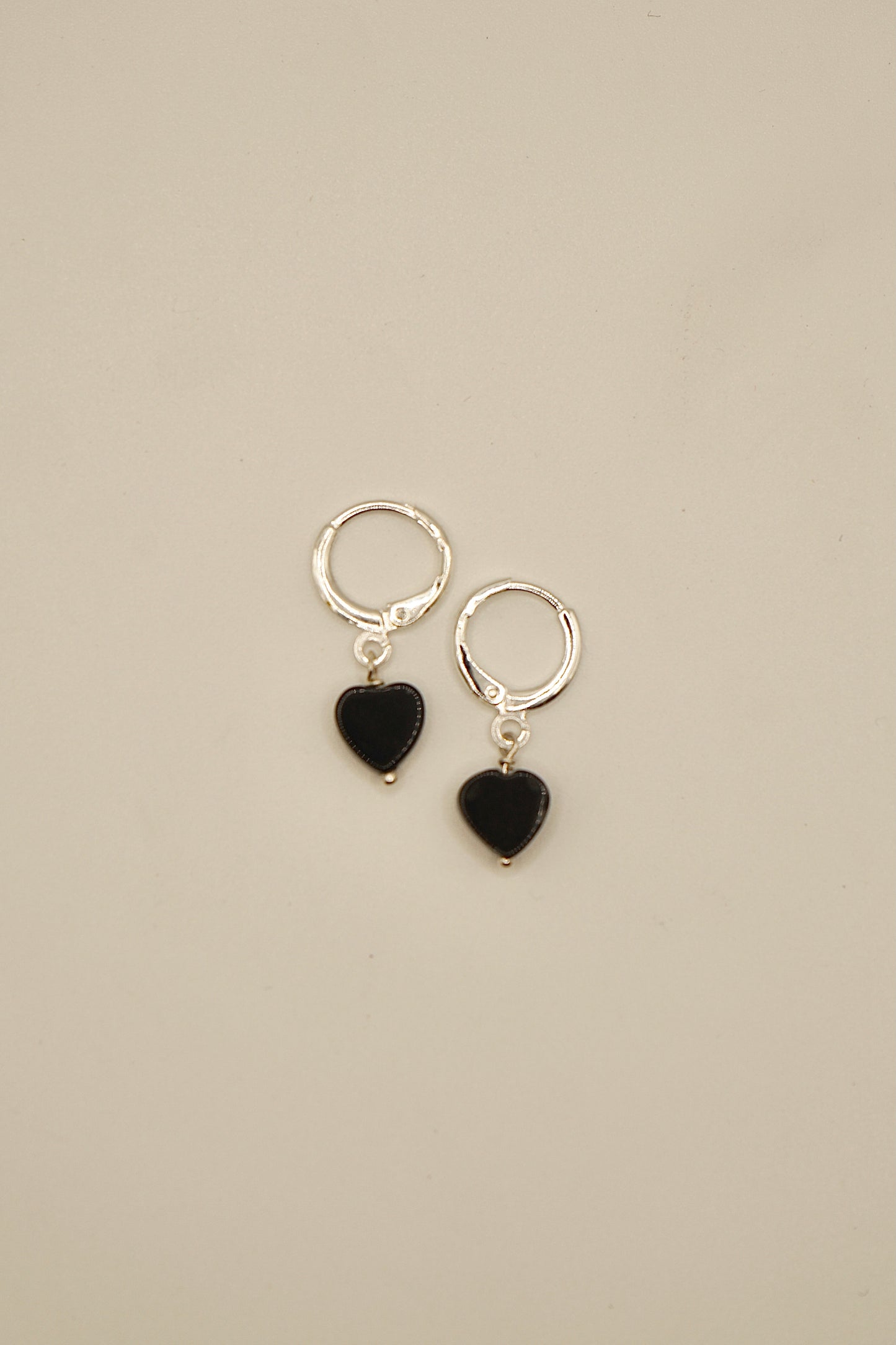 Sterling silver subtle heart onyx earrings