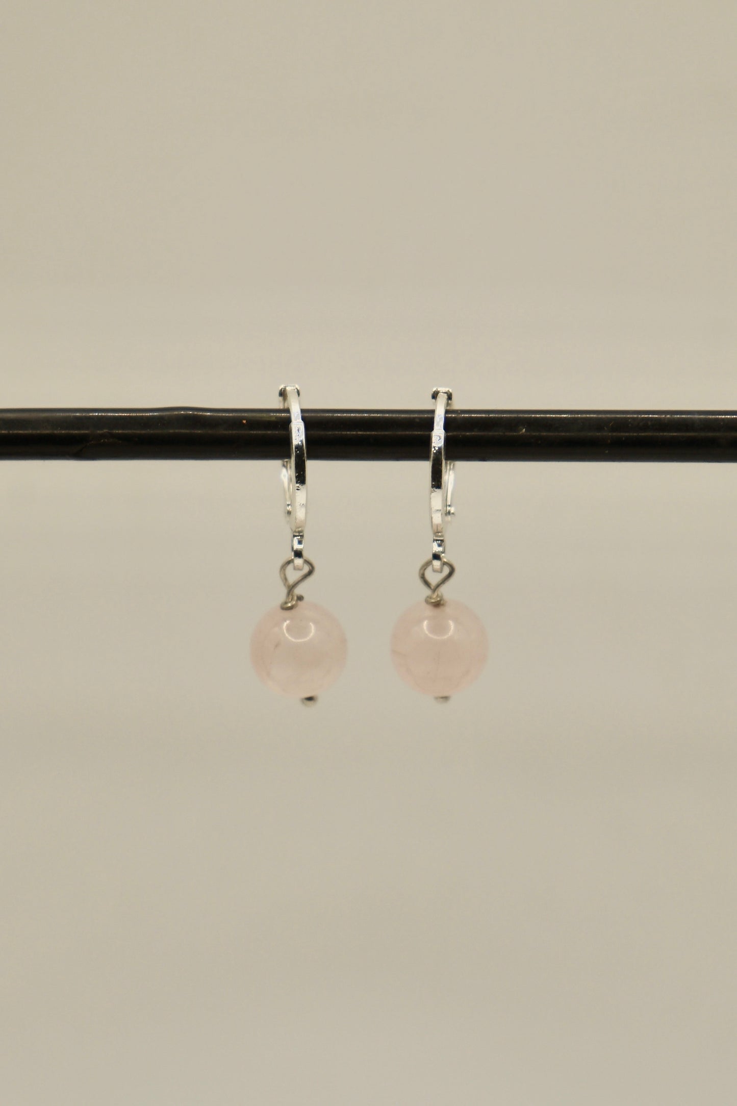 Sterling silver round rose quartz earrings