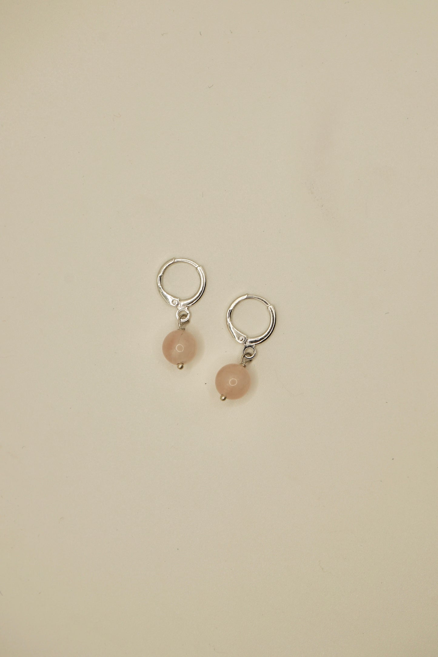 Sterling silver round rose quartz earrings